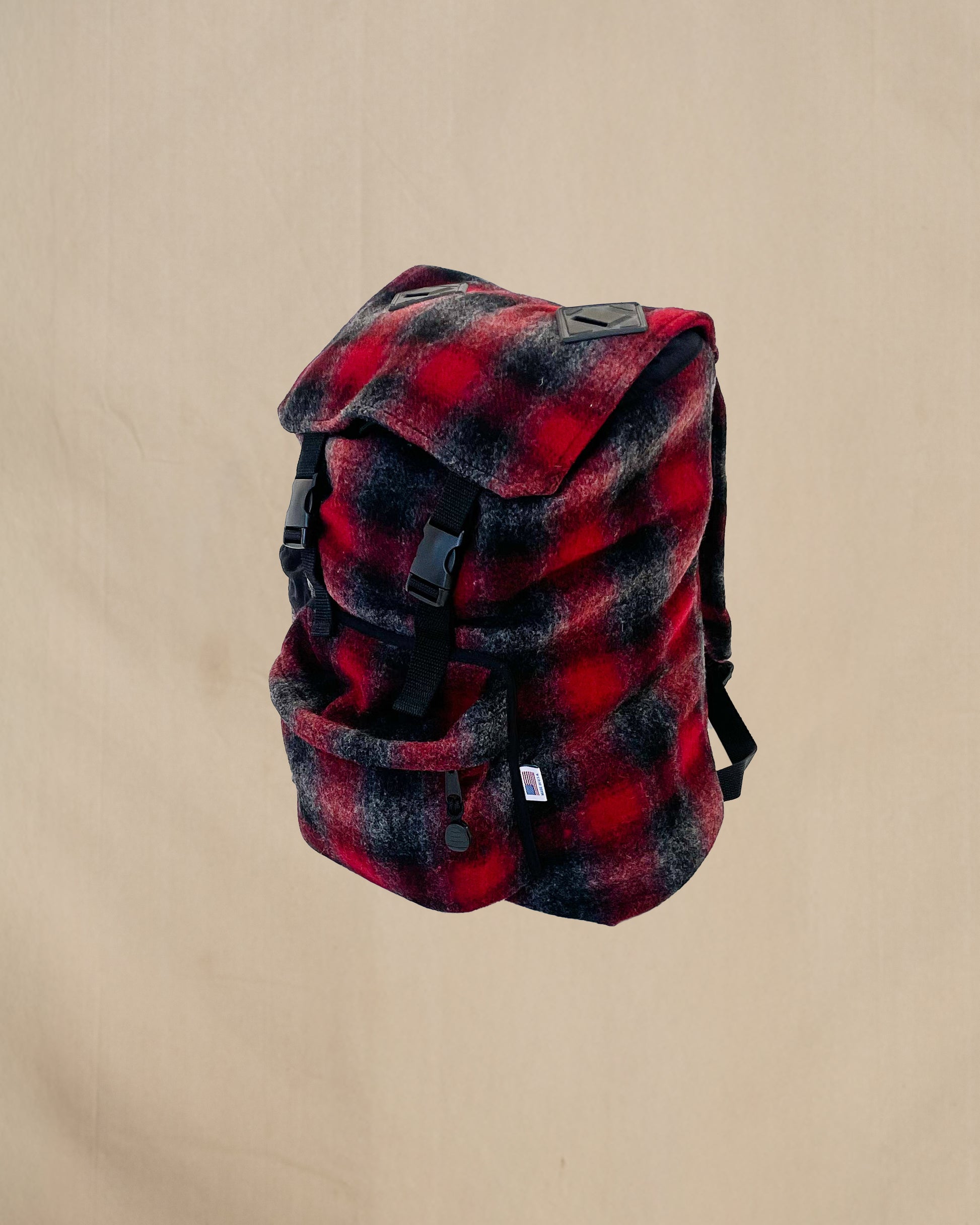 Wool back pack red , black and gray muted plaid