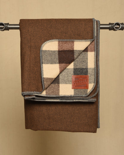 Flannel lined brown check blanket hanging