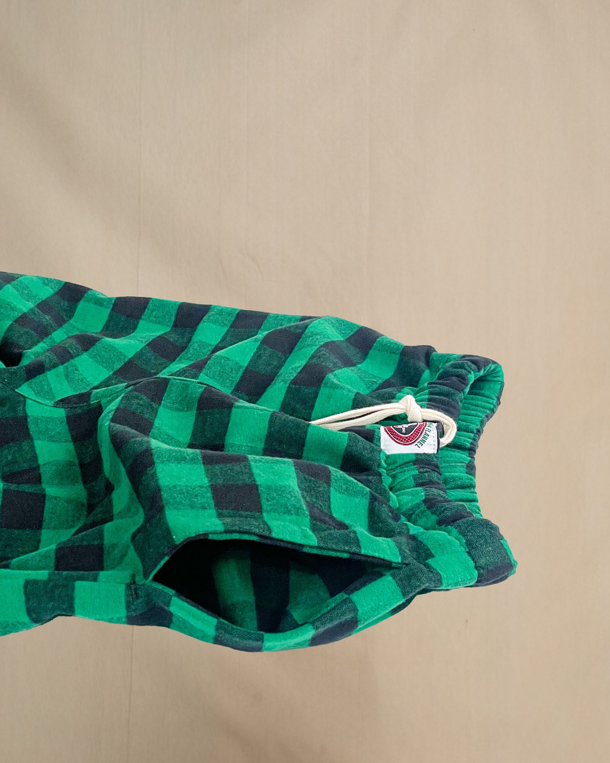 Green and black buffalo check flannel lounge pants pocket detail