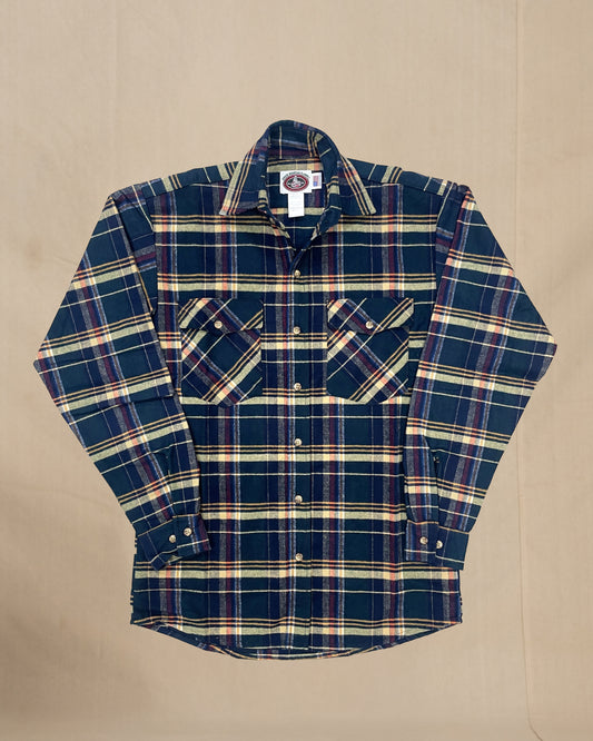 Plaid shirt with a visible Johnson label on a beige background