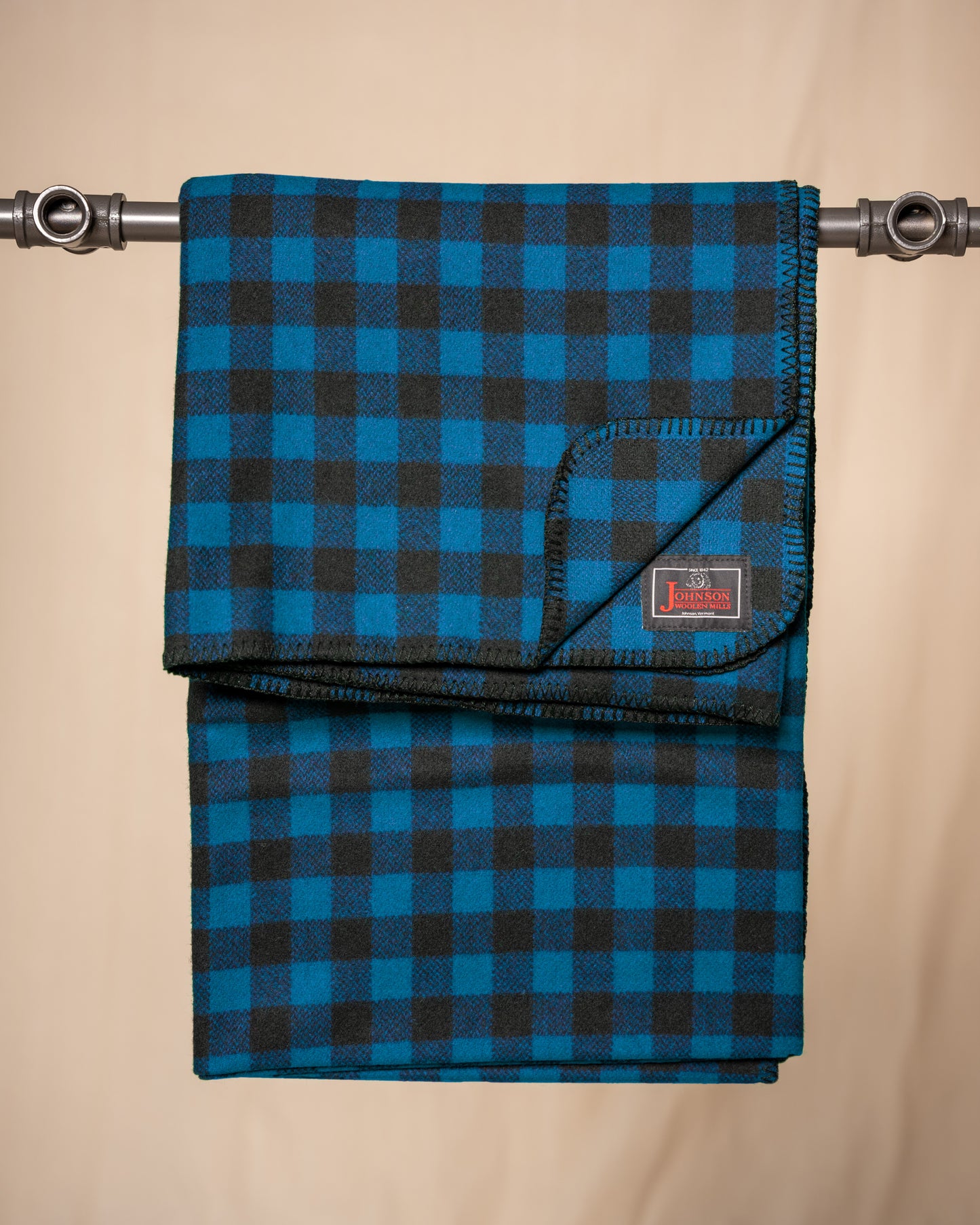 Johnson Woolen Mills throws Blue & Black 1 inch buffalo squares folded front view