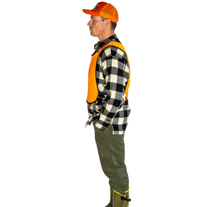 Northwoods 1842 blaze orange pinny side view on model, over red and black checked wool shirt