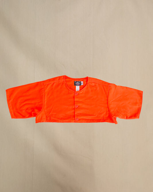 Blaze orange safety cape, designed to work over any Johnson Woolen Mills coat or jacket. Short sleeved, Blaze Orange with three button front & two bottom button holes