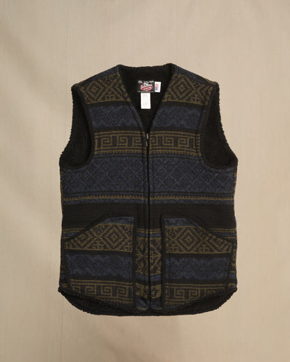 Vest with sherpa lining, blue/olive/black Aztec print, zipper front with two pockets, zipped front view
