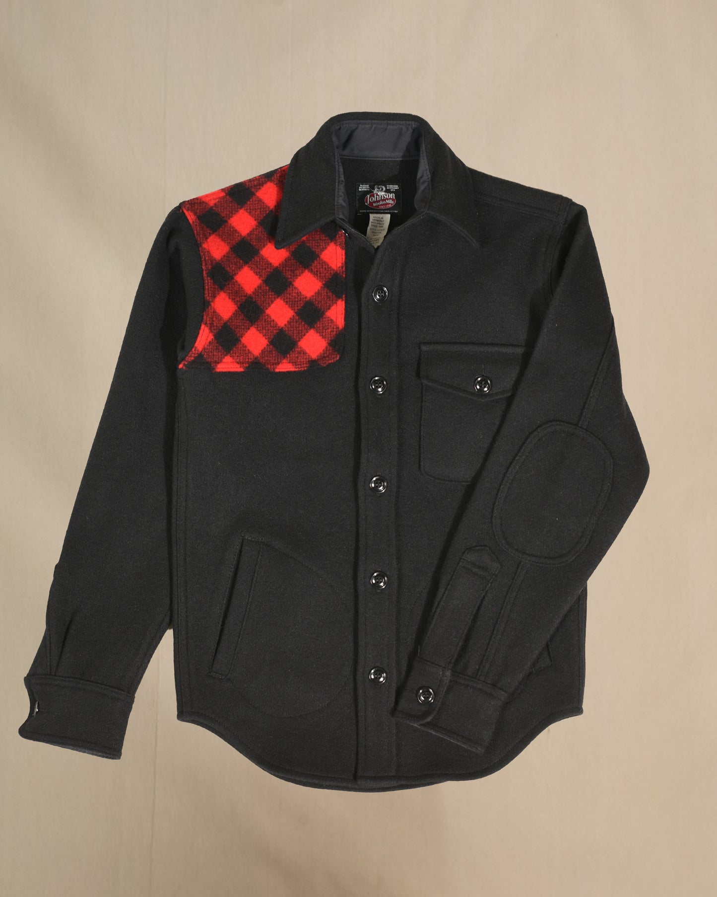 Shooter shirt with red and black buffalo plaid shoulder