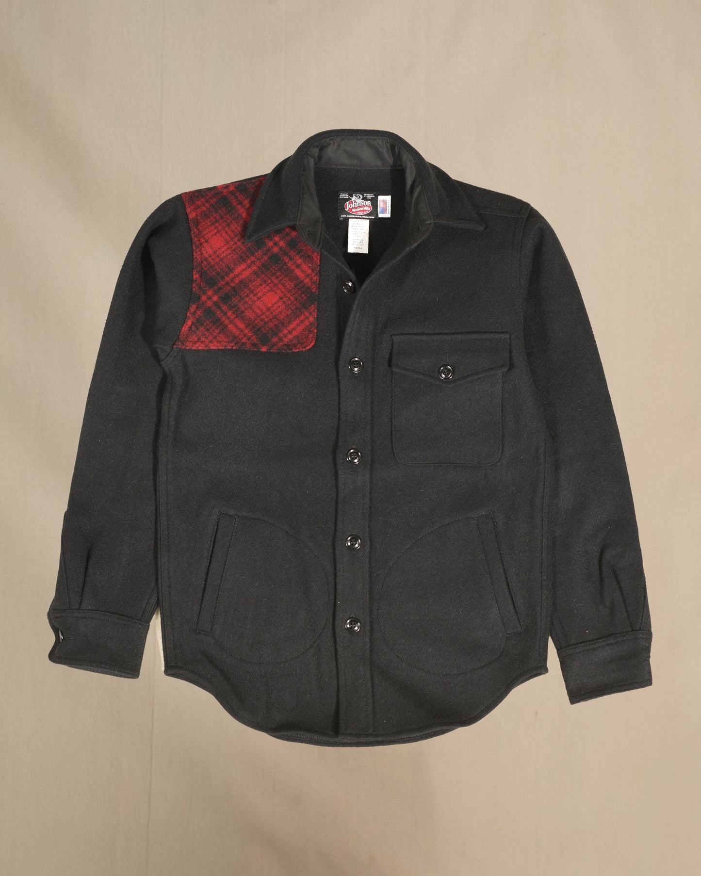 Shooter shirt with red and black muted plaid shoulder