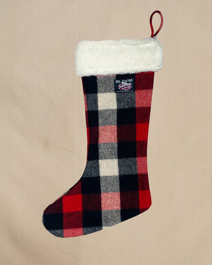 Plaid Wool Christmas stocking with a pattern on a beige background