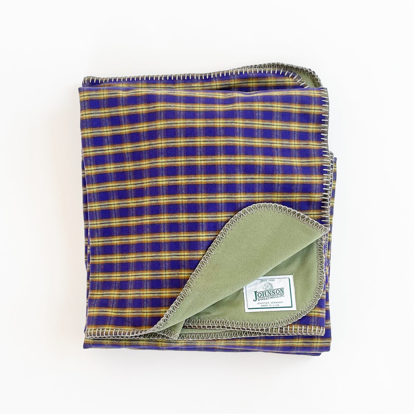 Green Mountain Flannel Throw Bali purple & green stripes with lime green fleece lining open corner view