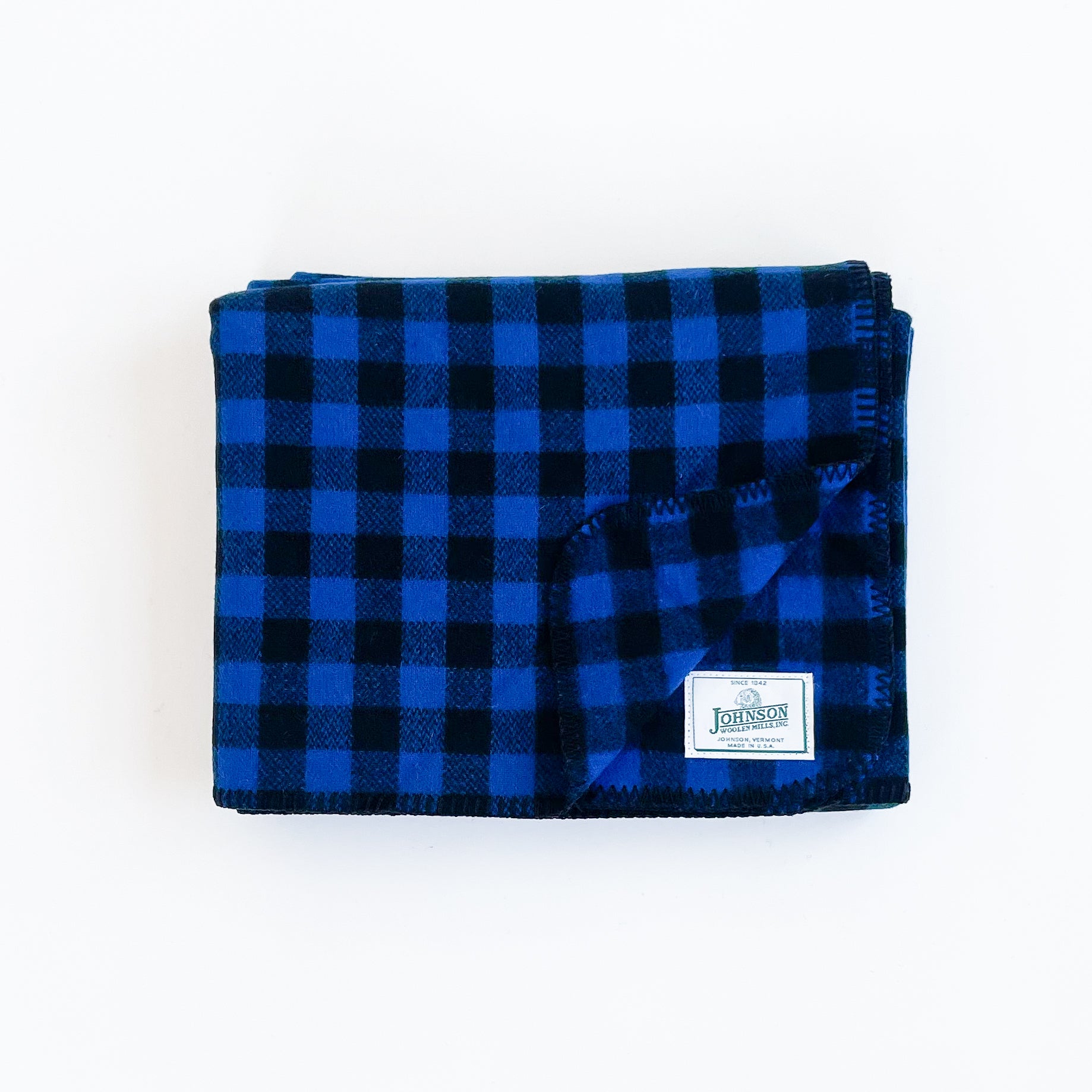Johnson Woolen Mills throws Bluecheck, Blue & Black buffalo 1 inch squares folded front view