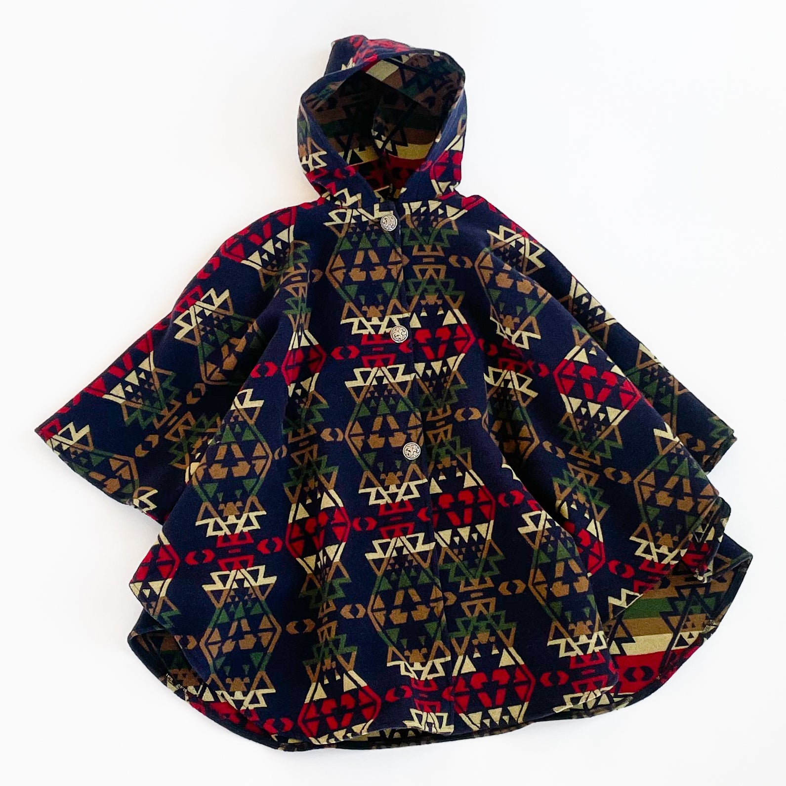 Johnson Woolen Mills Button Cape with  hood. Blue Indian Print front view