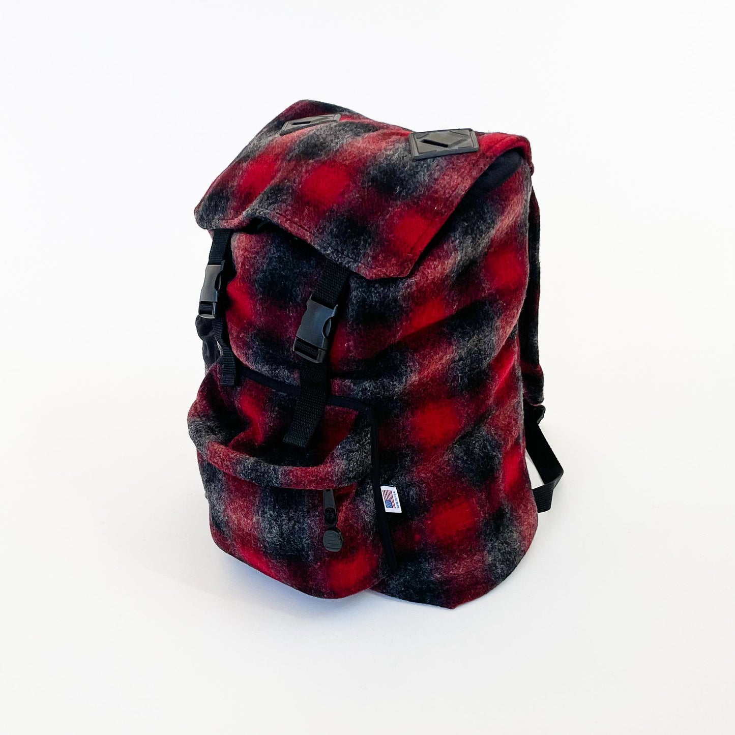 Wool back pack red , black and gray muted plaid