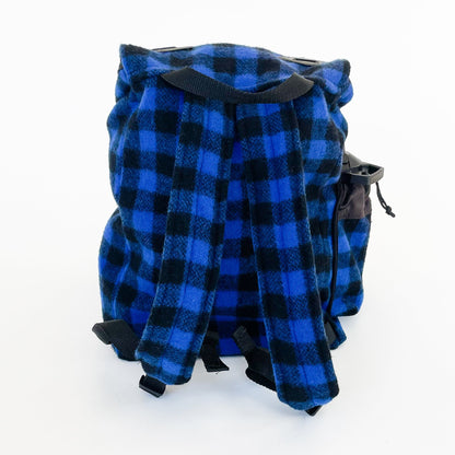 Johnson Woolen Mills Daypack Blue & Black 1 inch buffalo squares back view with water bottle in side pocket