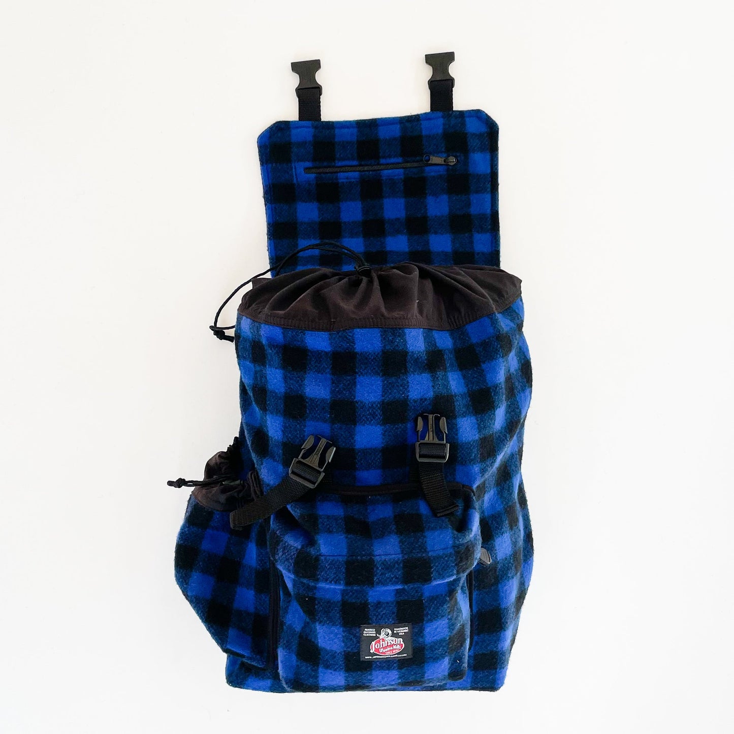 Johnson Woolen Mills Daypack Blue & Black 1 inch buffalo squares front view with water bottle in side pocket