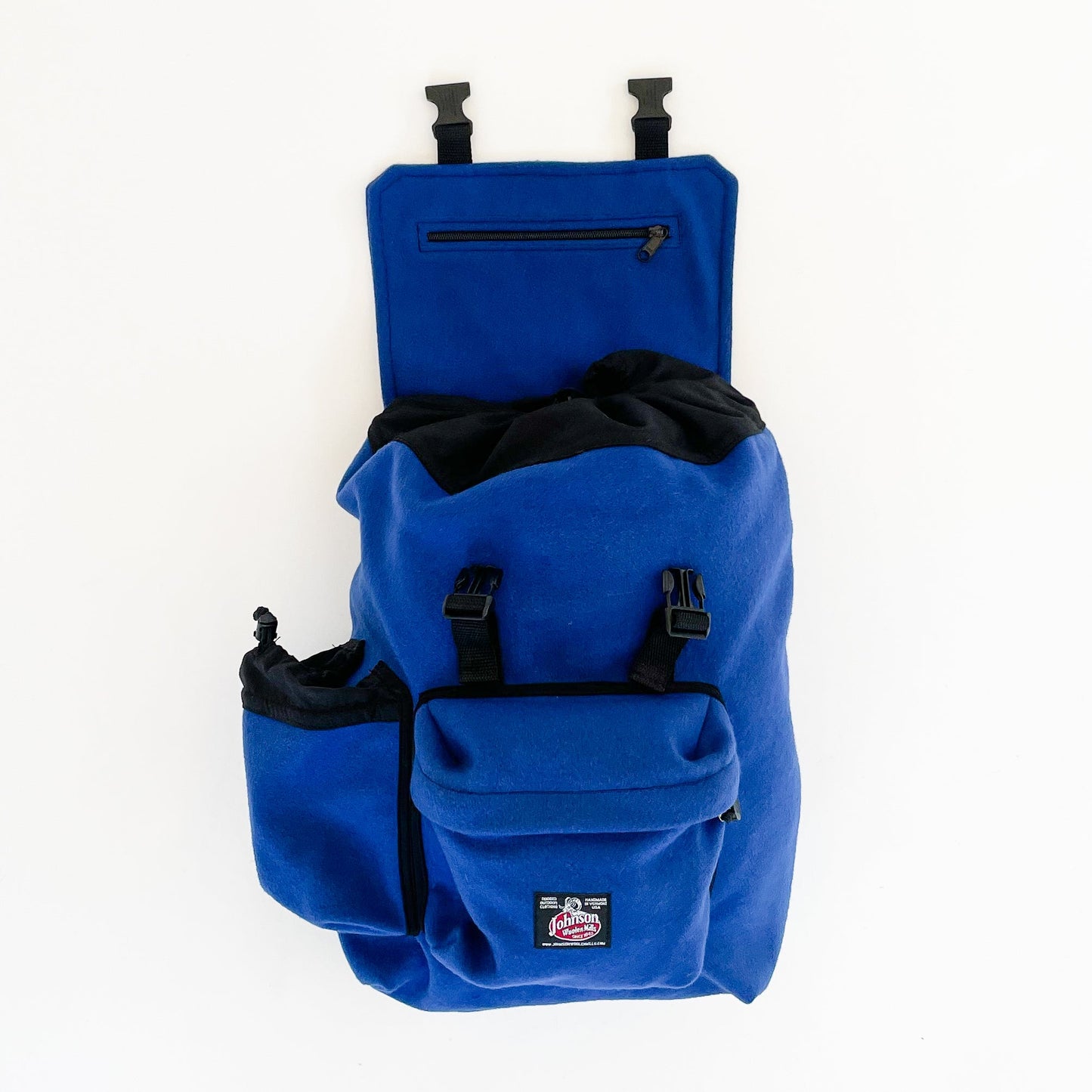 ohnson Woolen Mills Daypack Royal Blue front view with water bottle in side pocket and top flap open