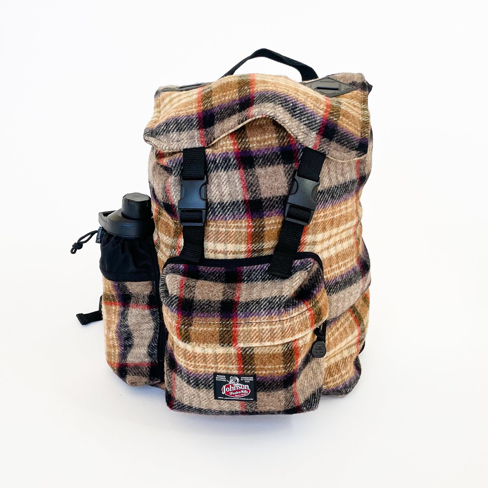 Wool back pack in gold, black and red plaid, shown with water bottle in side pocket