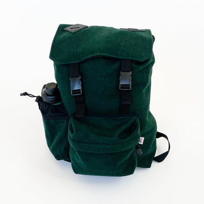 Wool back pack - Spruce green with water bottle shown in side pocket