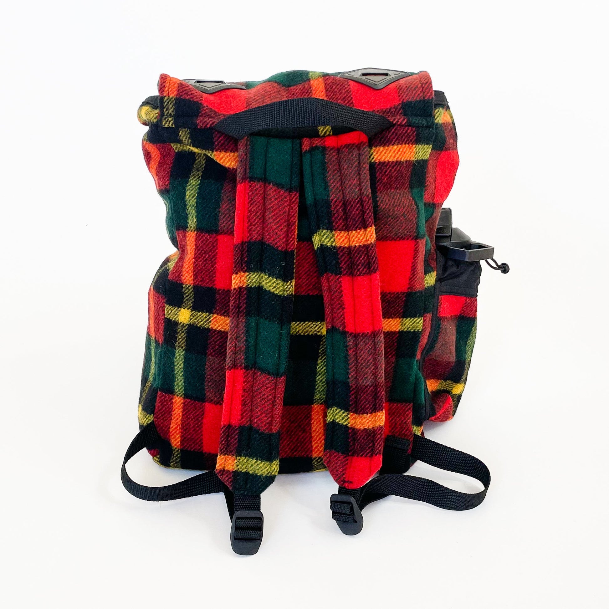 Johnson Woolen Mills Daypack Bright Red/Green/Yellow back view with water bottle in side pocket