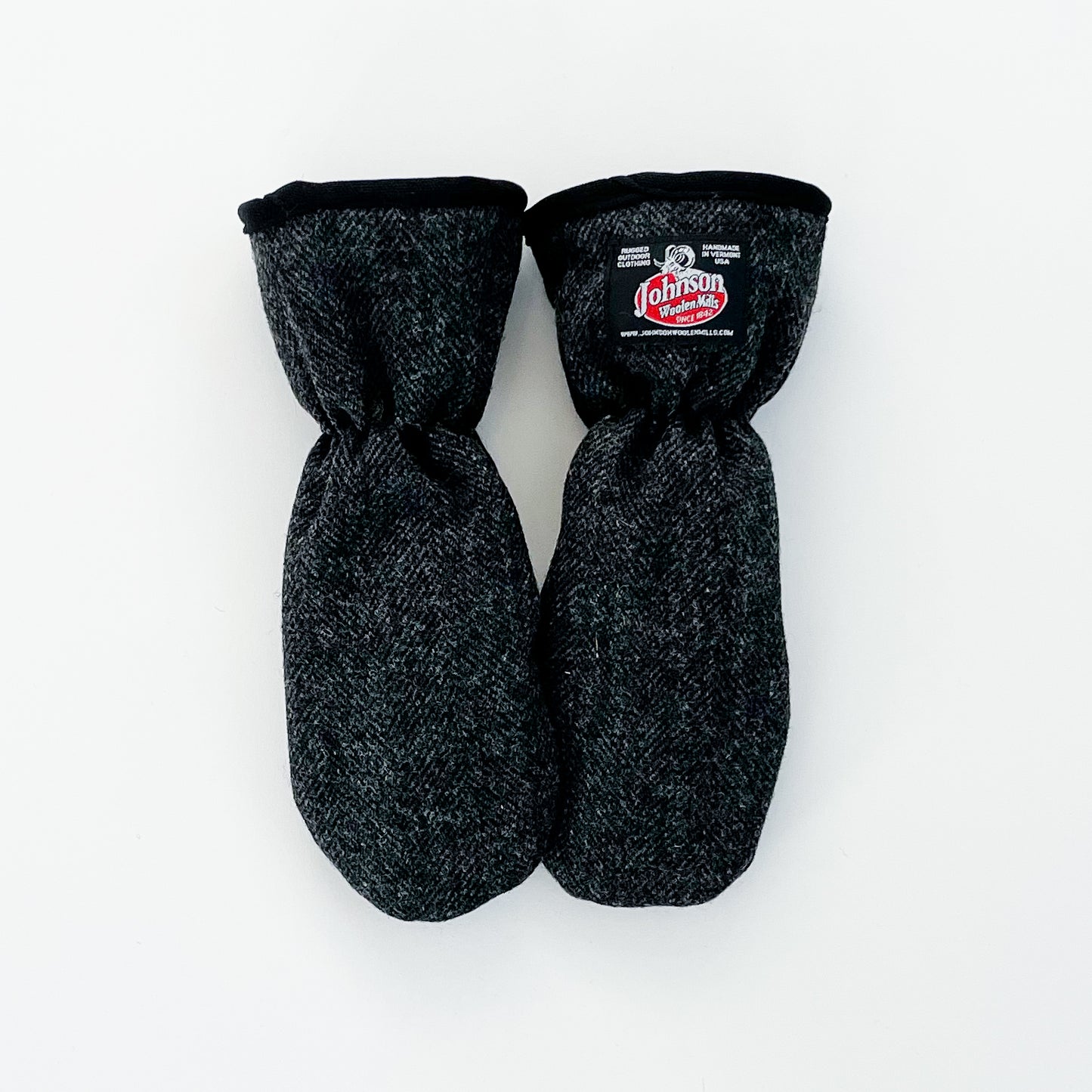Johnson Woolen Mills mittens - grey herringbone with black piping - logo patch - front view 