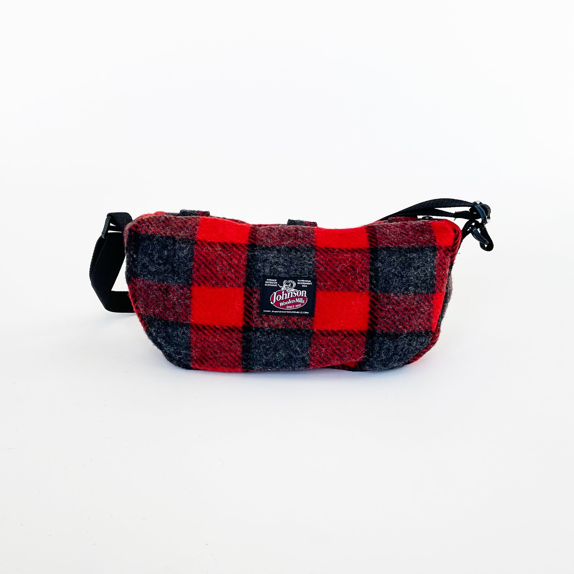 Wool sidewinder bag with strap - bag with zipped closure and belt loops for wearing on your waist plus shoulder strap. Shown in red and gray plaid