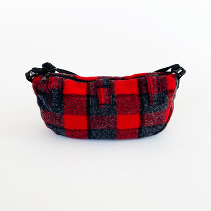 Wool sidewinder bag with strap - bag with zipped closure and belt loops for wearing on your waist plus shoulder strap. Shown in red and gray plaid, back view