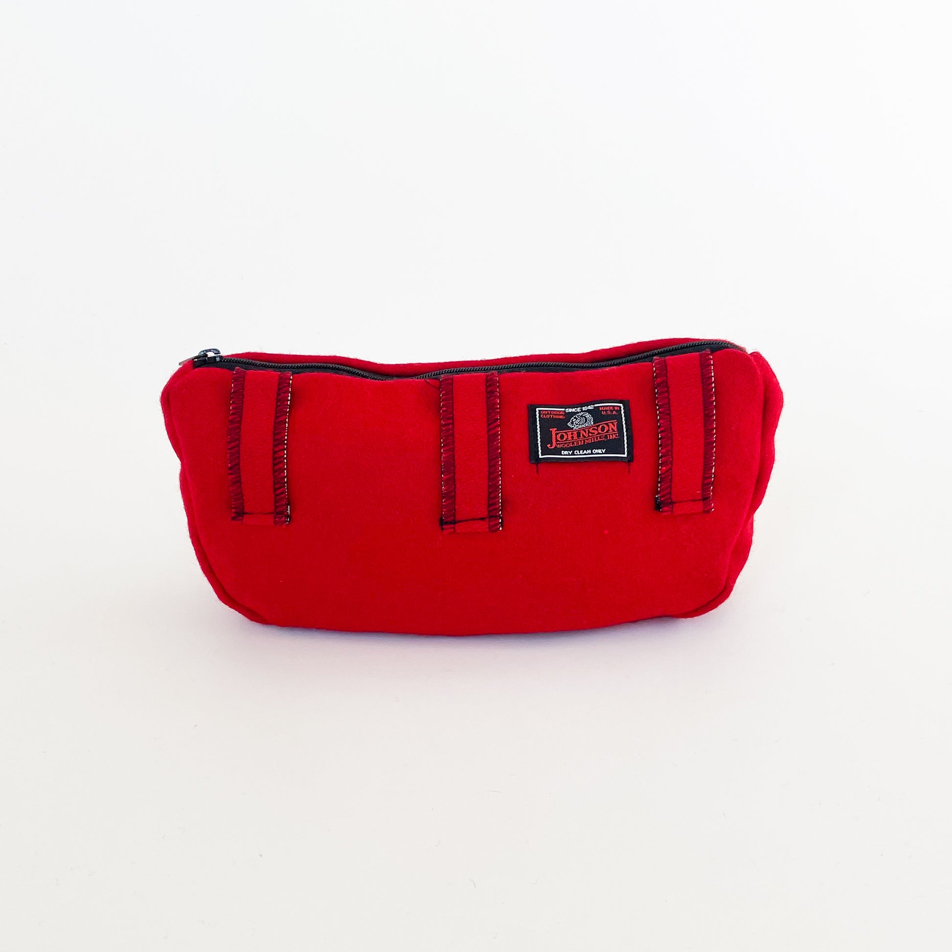 Wool sidewinder - bag with zipped closure and belt loops for wearing on your waist. Shown in scarlett. Back view
