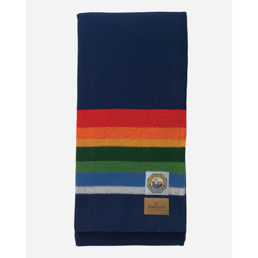 Pendleton Blanket, Crater, dark blue background, with blue/white/green/red/orange stripes unfolded view