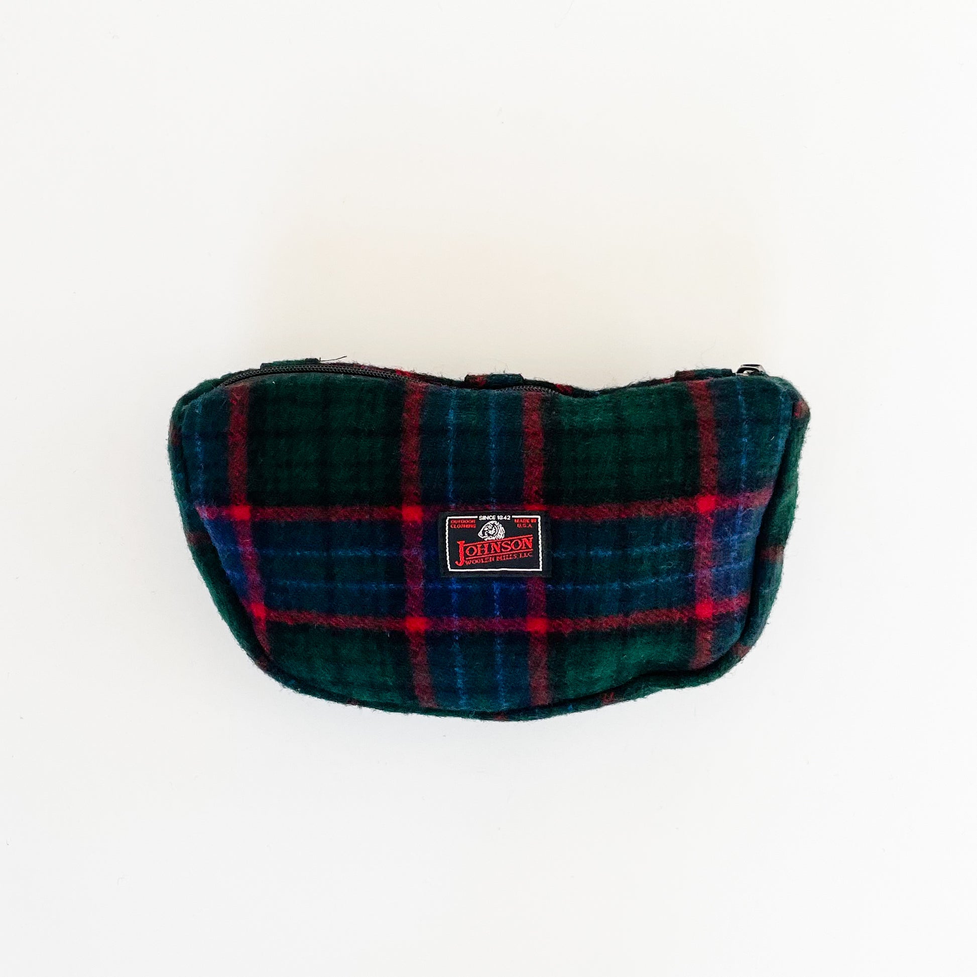 Wool sidewinder - bag with zipped closure and belt loops for wearing on your waist. Shown in green, blue and red plaid.