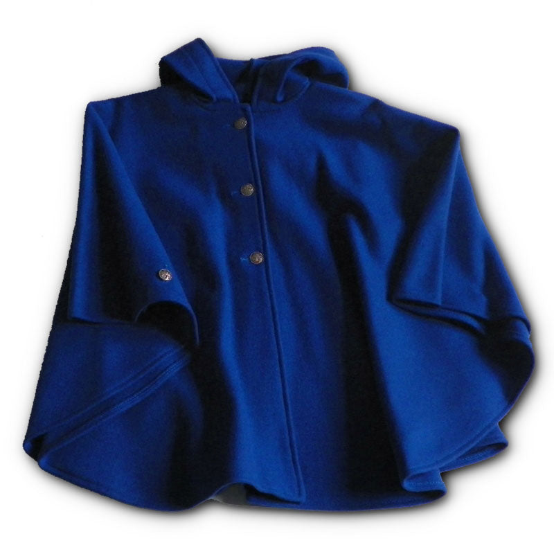  Wool cape with three Norwegian pewter buttons with matching button on sleeve, and a large hood.  Shown in royal blue.