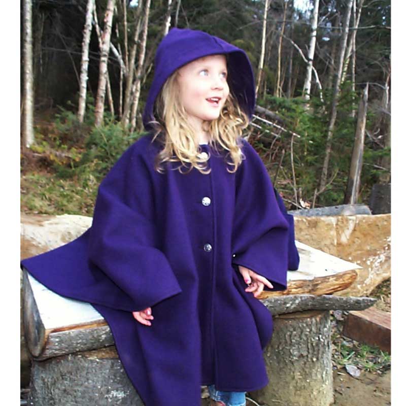 Children's wool cape with three Norwegian pewter buttons  and a large hood.  Shown on model in purple.